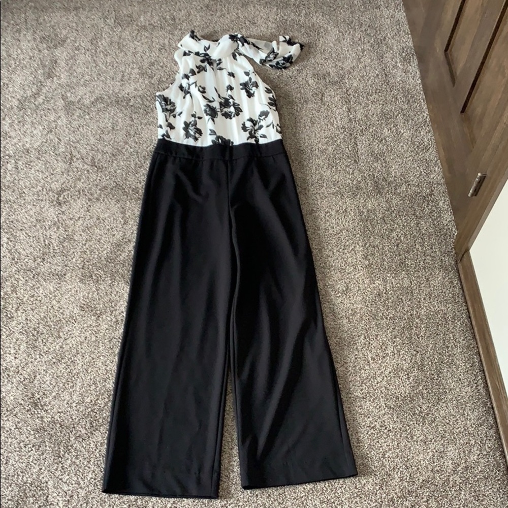 Whit and black jumper.